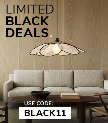 Promotionsbillede for Extra Black Deals med en hvid foldet bordlampe på en beige stofbaggrund og rabatkoden ‘EXTRABLACK10