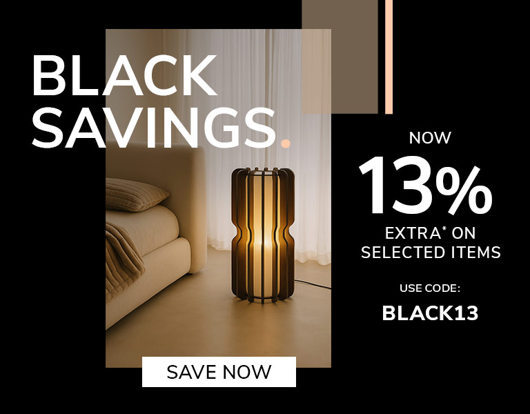 A modern interior scene featuring a decorative wooden floor lamp glowing warmly beside a beige sofa. On the right, bold promotional text reads “Black Savings. Now 13% Extra on Selected Items. Use code: BLACK13,” with a button saying “Save Now.” The design